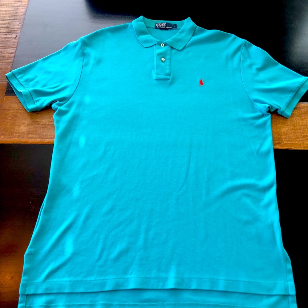 This shirt is crafted from silky Pima cotton and features embroidered red pony.